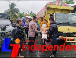 Harapan di Tengah Banjir: Polsek Pantai Cermin, Koramil, dan Pemerintah Hadir Ringankan Warga Terdampak